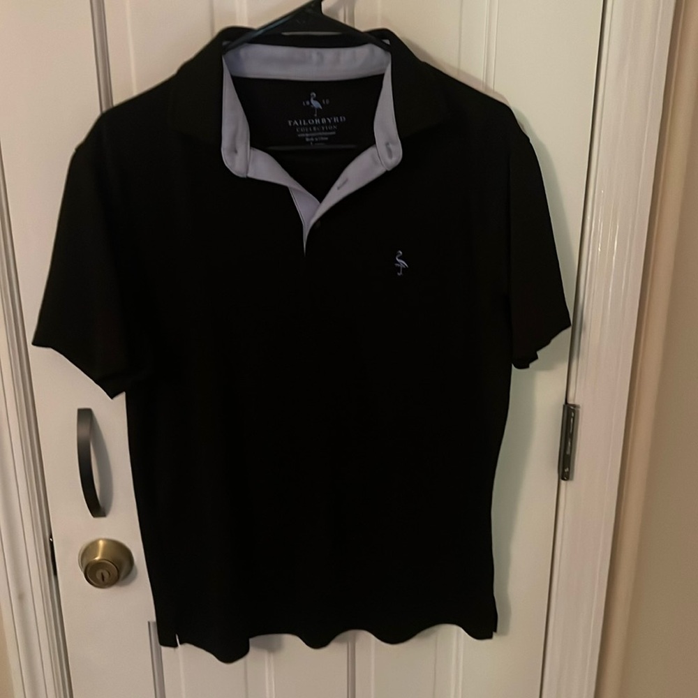Black dress polo. Great quality barely worn.